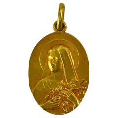 Vintage French 18K Yellow Gold St Therese Charm Pendant
