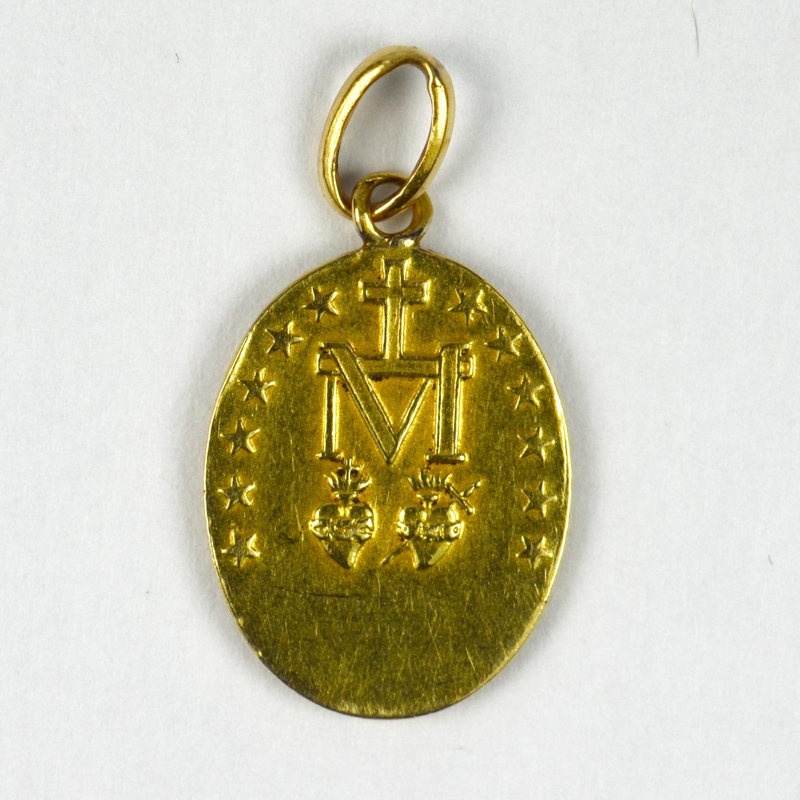 18 karat gold miraculous medal