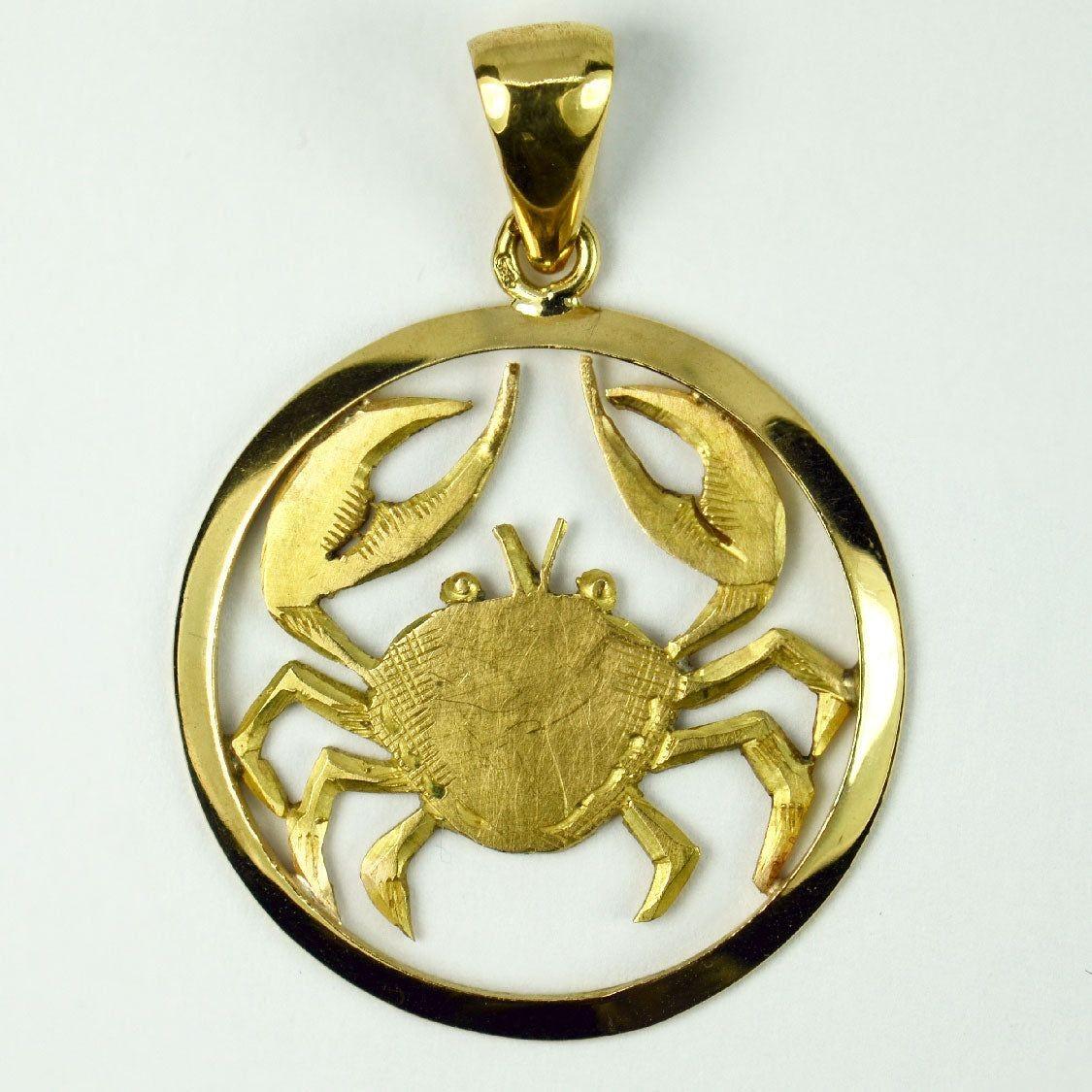 A French 18 karat (18K) yellow gold charm pendant designed as the Zodiac sign of Cancer depicting a crab. Stamped with the eagles head for French manufacture and 18 karat gold with an unknown maker’s mark.

Dimensions: 3.1 x 2.7 x 0.15 cm (not