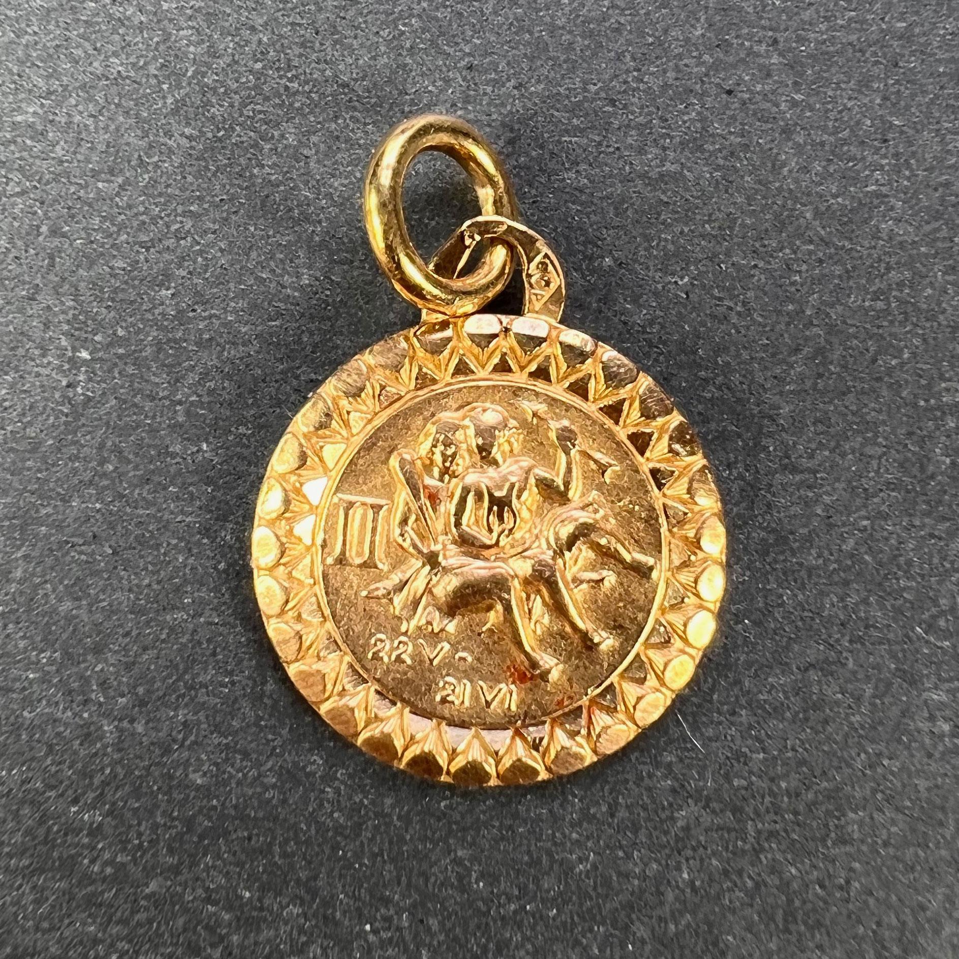 A French 18 karat (18K) yellow gold charm pendant designed as the Zodiac sign of Gemini. Stamped with the French eagle’s head for 18 karat gold and an unknown maker’s mark. 

Dimensions: 1.6 x 1.4 x 0.15 cm
Weight: 1.26 grams
