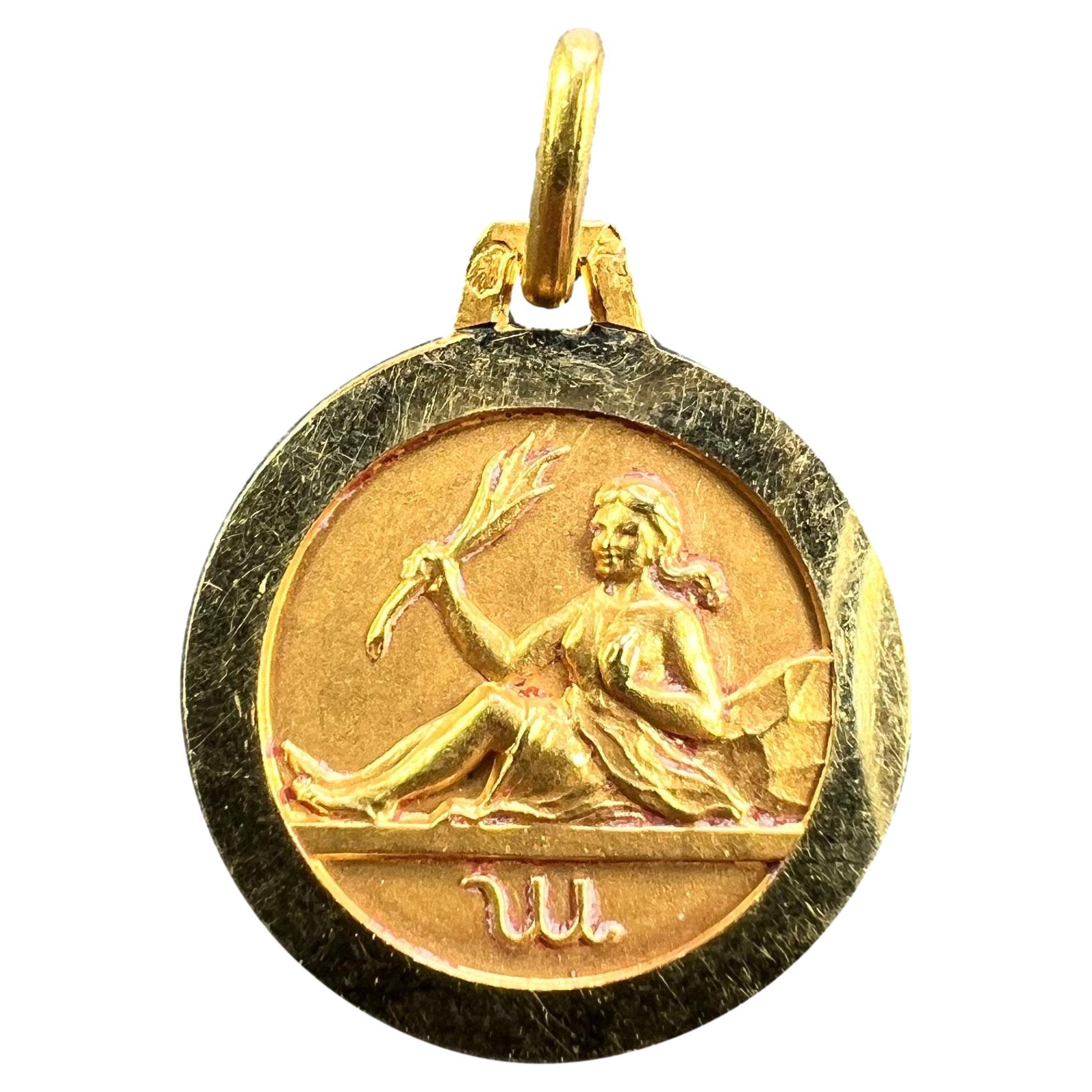 Colgante de oro amarillo de 18 quilates con un amuleto del zodiaco francés Virgo