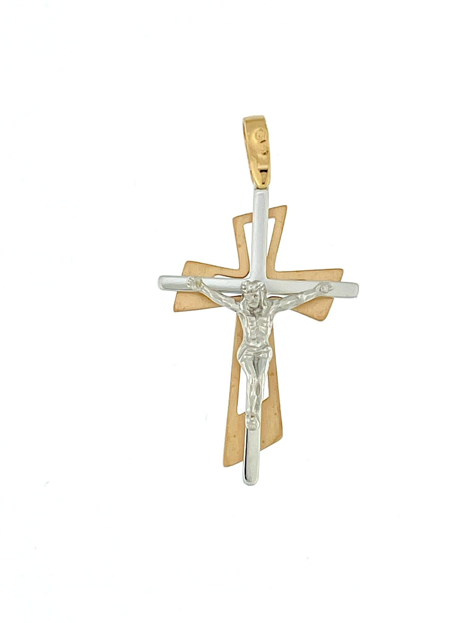 This exquisite crucifix is crafted from a combination of 18-karat rose and white gold, showcasing a meticulous blend of elegance and religious symbolism. The body of Jesus, a central and spiritually significant element, is crafted from white gold,