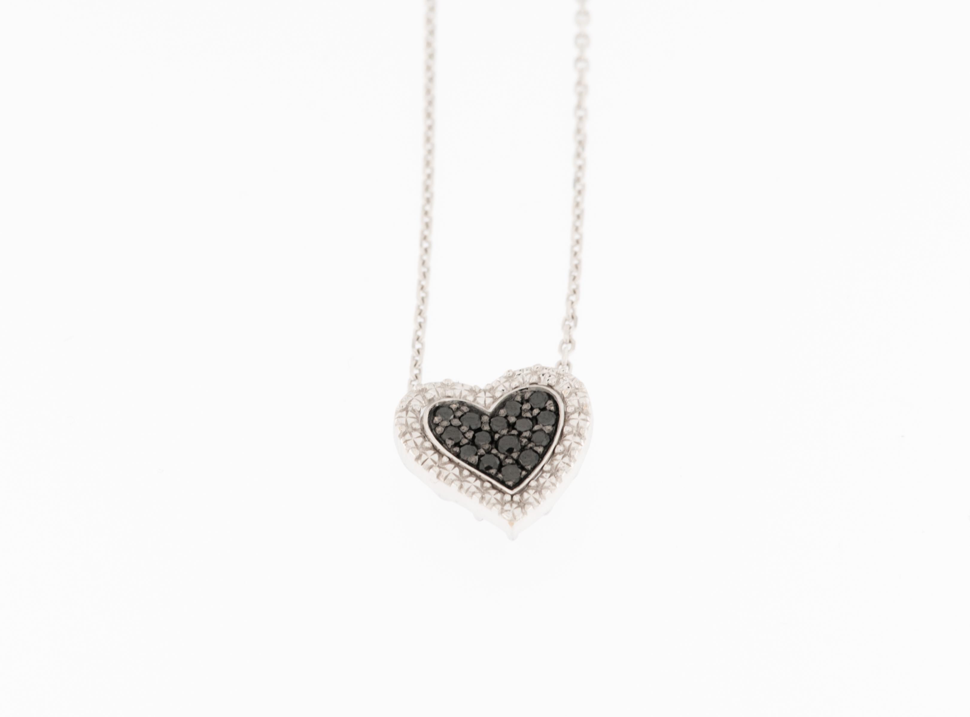 Modern French 18kt White Gold Heart Necklace with Black Diamonds For Sale