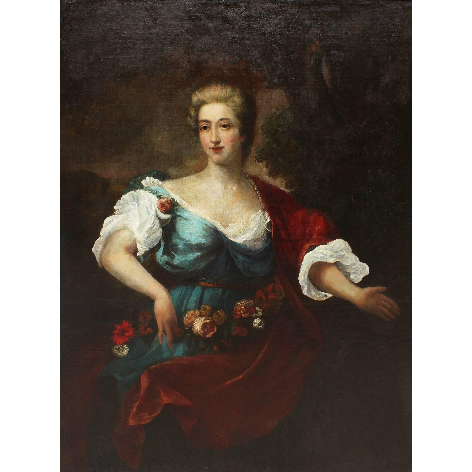 Très beau portrait à l'huile sur toile d'une dame posant avec des fleurs, d'après Jean-Marc Nattier (1685-1766), dans un cadre orné en bois sculpté et doré, vers 1800.

Dimensions : Hauteur de l'huile 51 3/8 pouces (130,5 cm)
Largeur de l'huile
