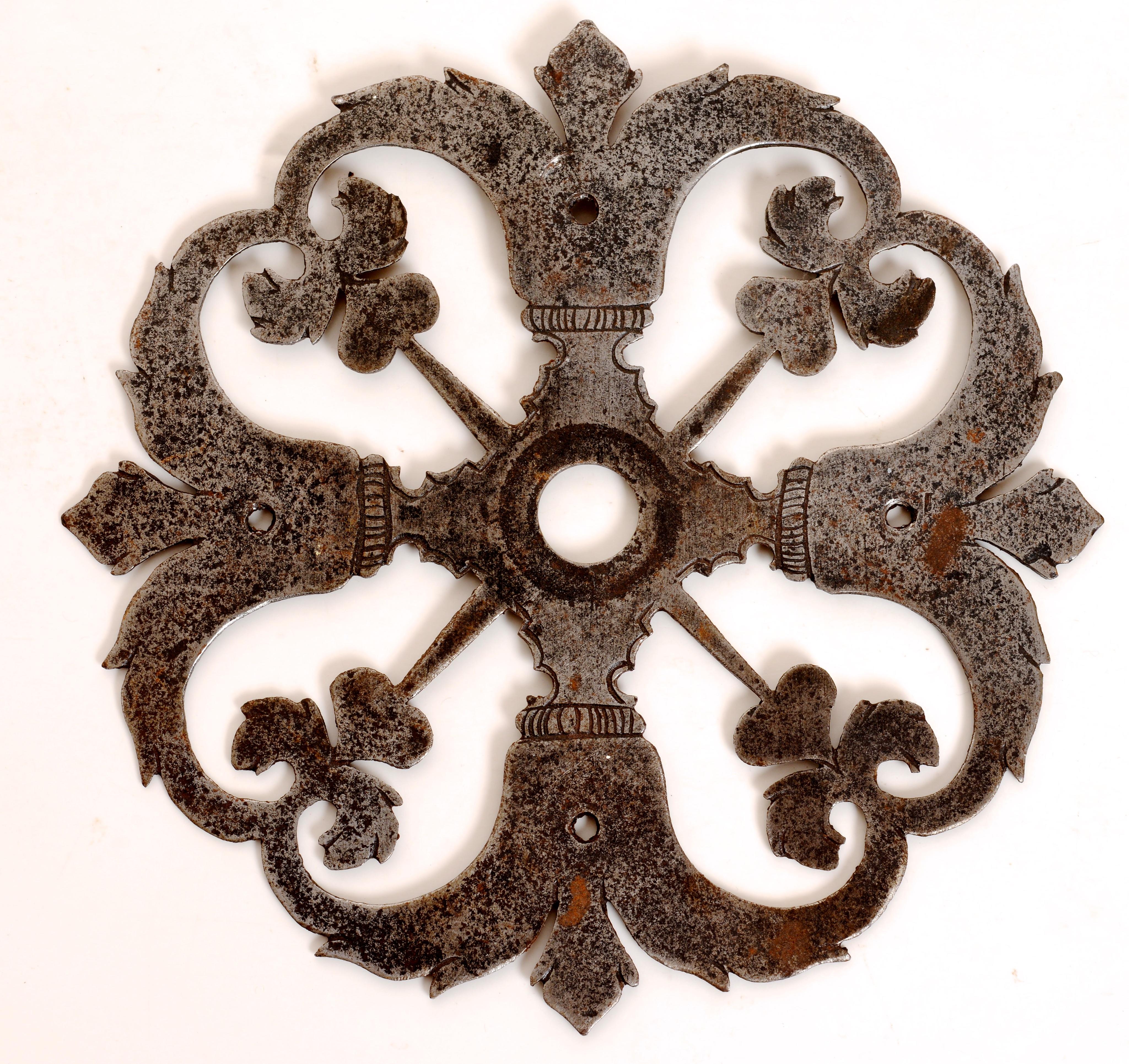 French 18th c Door Knocker with Original Cast Iron Knocker and Wrought Iron Back. This hand-wrought iron door knocker with a pierced scrolling back plate in Fleur-de-lis, floral and c-scroll patterns with hand etched decoration. The back plate is