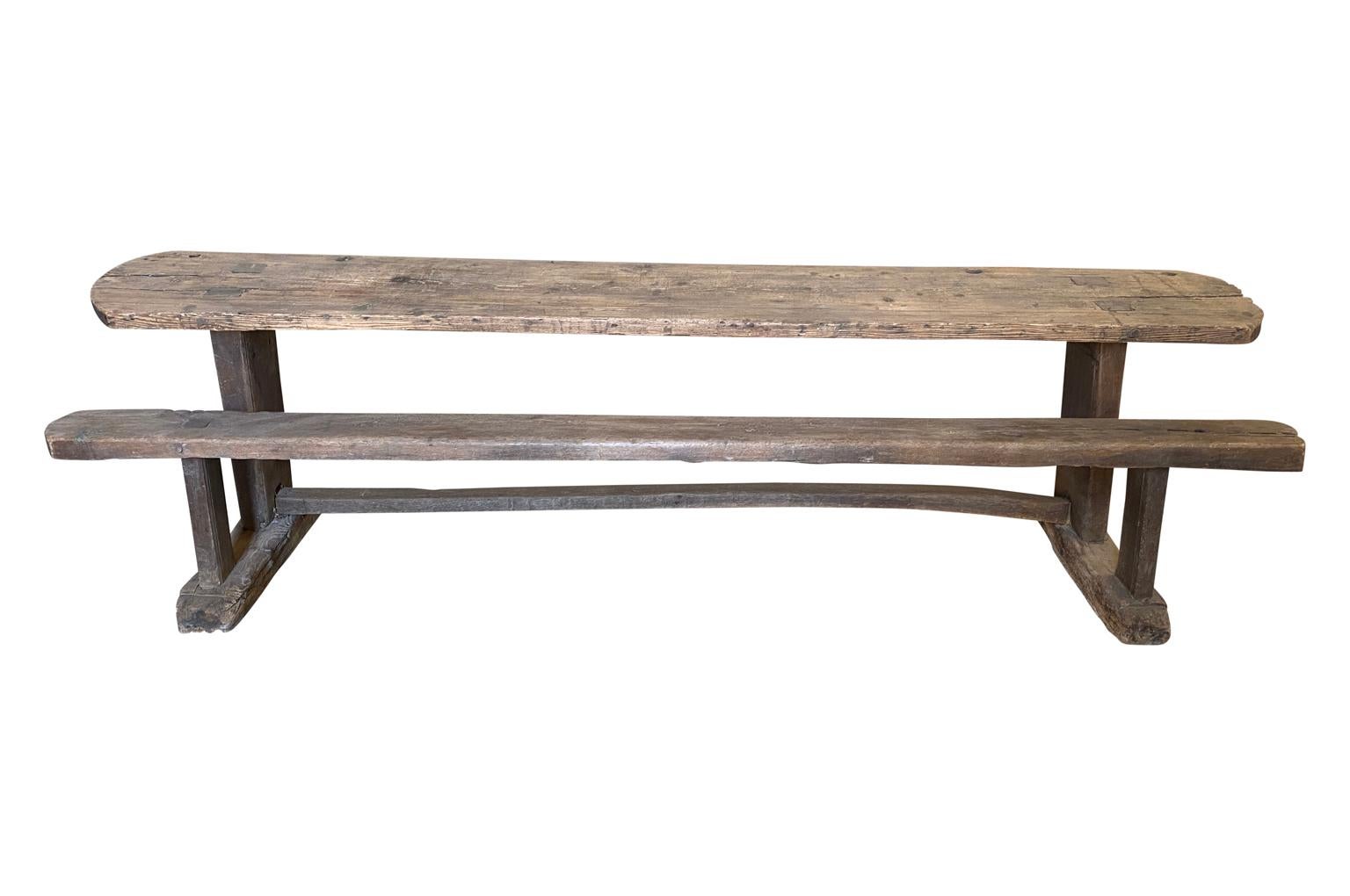 A wonderful 18th century Banc Doleance - Grievance Bench from the South of France in naturally washed wood. A terrific bench from which one can eat from while watching television, working or playing video games.