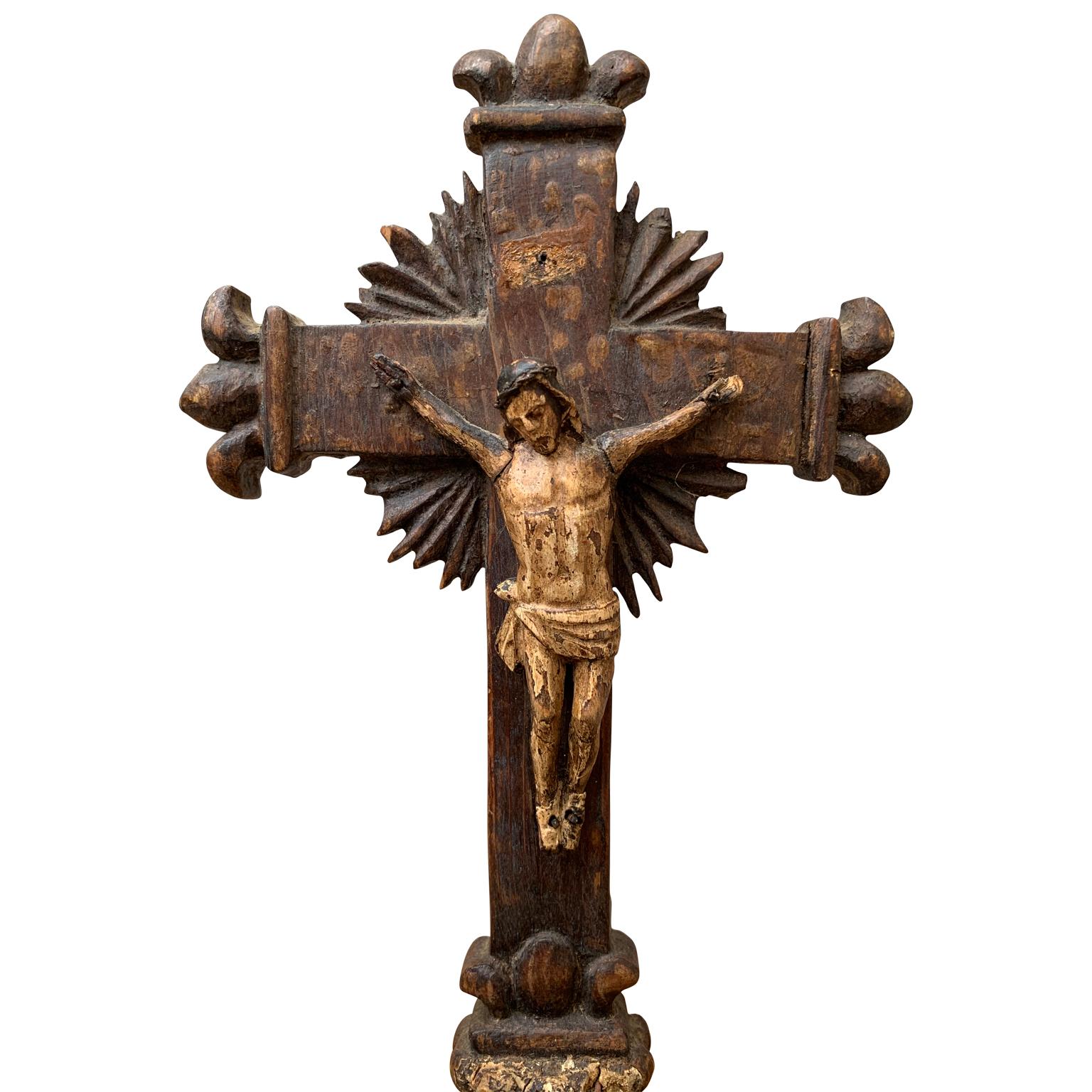 Early 18th Century antique hand carved and polychromed hand painted table crucifix from France with its original patina preserved.
The crucifix could possible mid to late 17th Century.