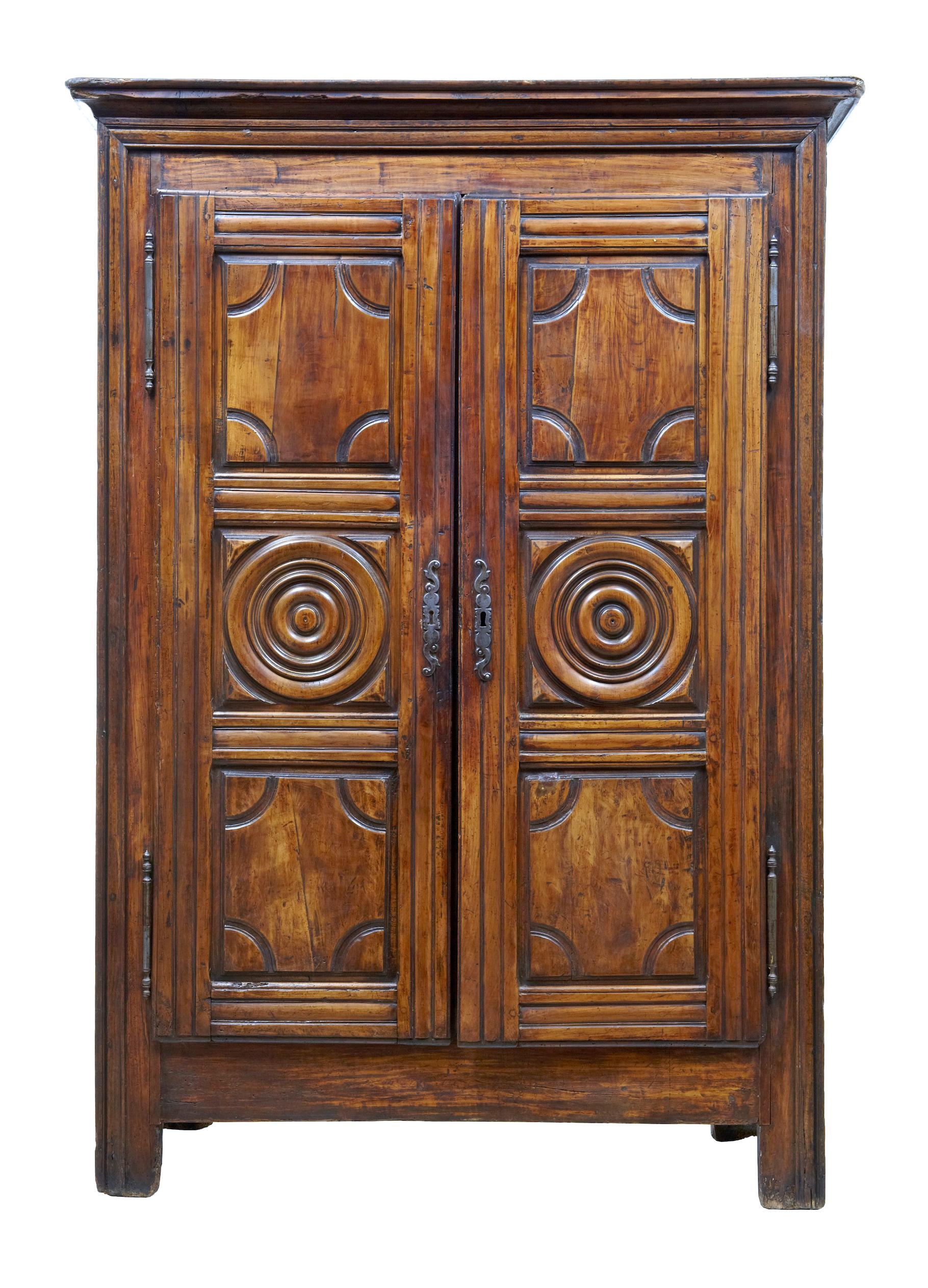 Original French fruitwood armoire, circa 1780. 

This French armoire would make an ideal tv unit or for its intended use. Original hinges and escutheons, double doors open up to reveal and interior of a small tapered shelf at the top, followed by