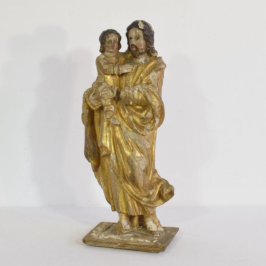 Beautiful weathered carved wooden saint statue with traces of its original paint and gilding.
France, circa 1750. Weathered, losses and old repairs.



  