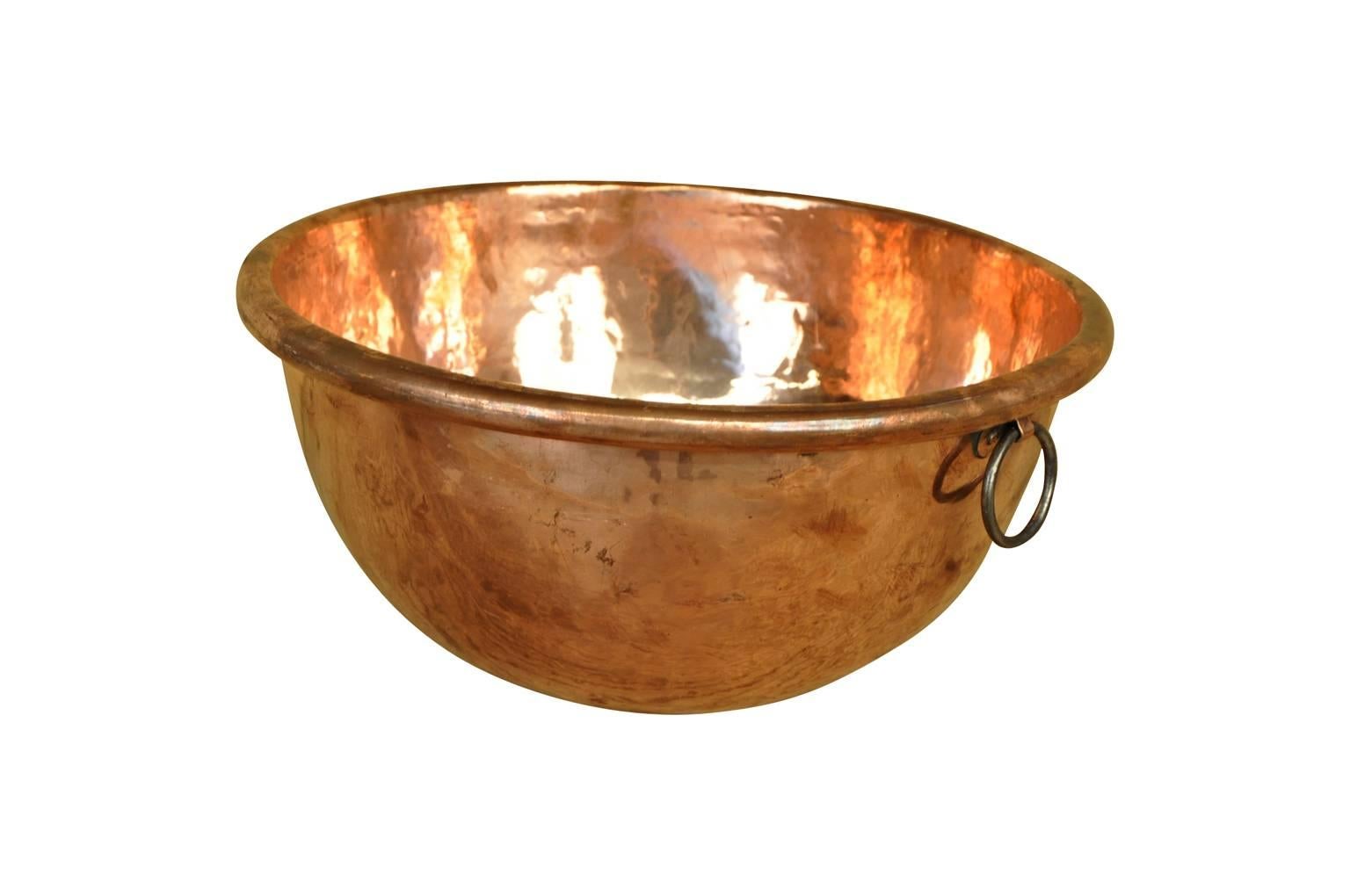 A wonderful 18th century French copper mixing bowl. A terrific accent piece for any kitchen.