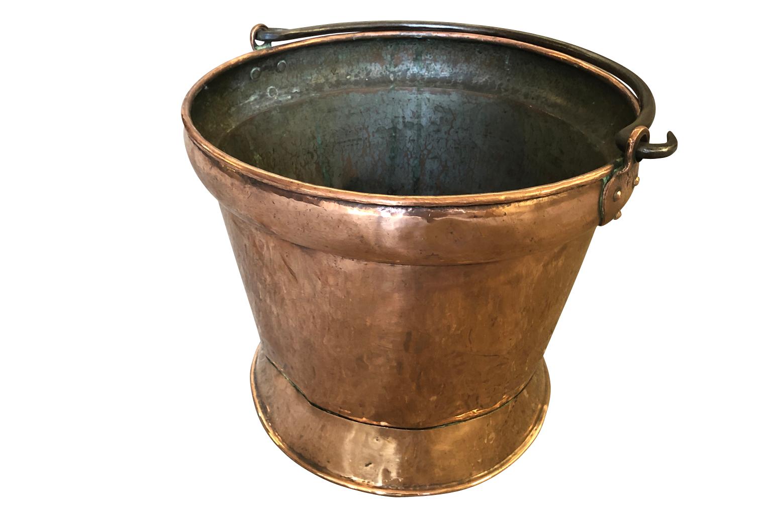 A very charming French 18th century copper bucket from the South of France. A perfect kitchen island accent piece.