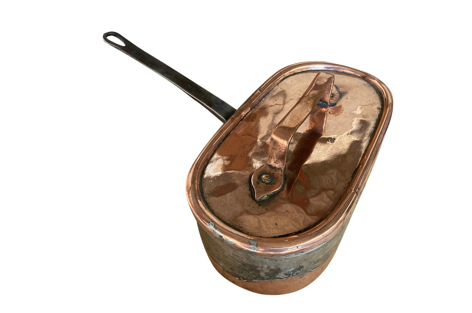 A wonderful 18th century copper pressure cooker from the Southwest of France.  A great addition to any copperware collection. 
