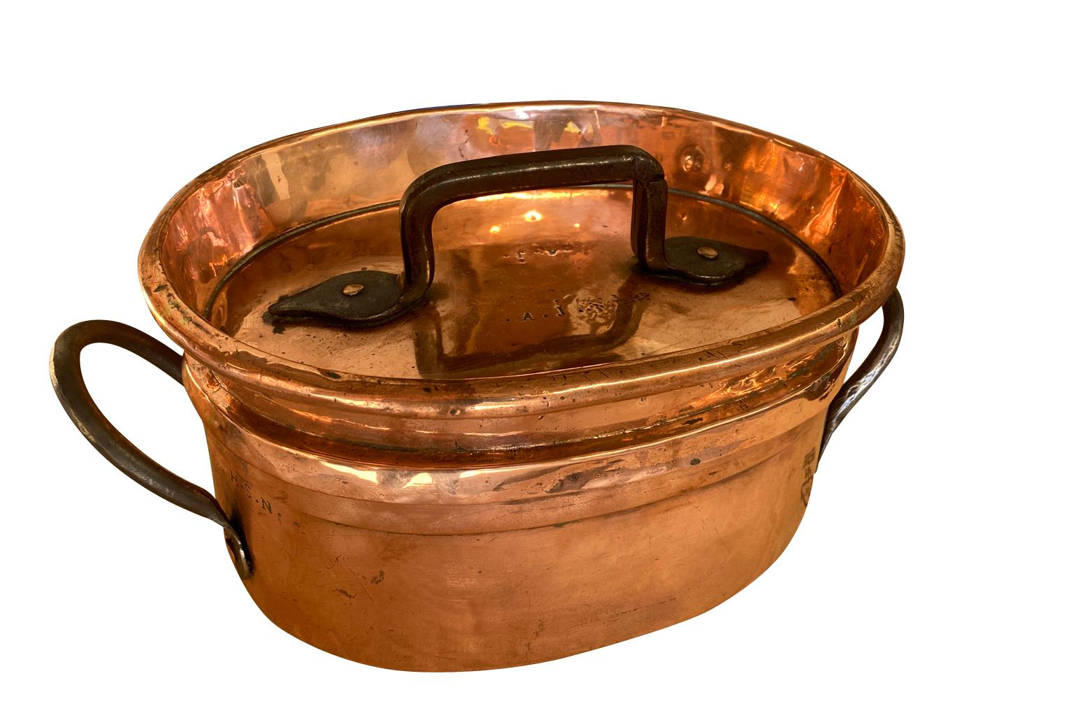 A wonderful 18th century oval shaped copper pressure cooker from the Southwest of France.  A great addition to any copperware collection. 
