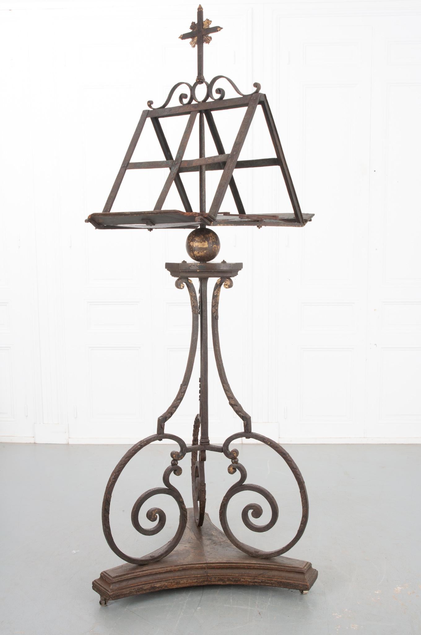 A stunning 18th century iron lectern from France. This would have been used on the altar to display a large bible during mass for the priest to read from. This is an instant conversation starter in any space because of its great height at over seven