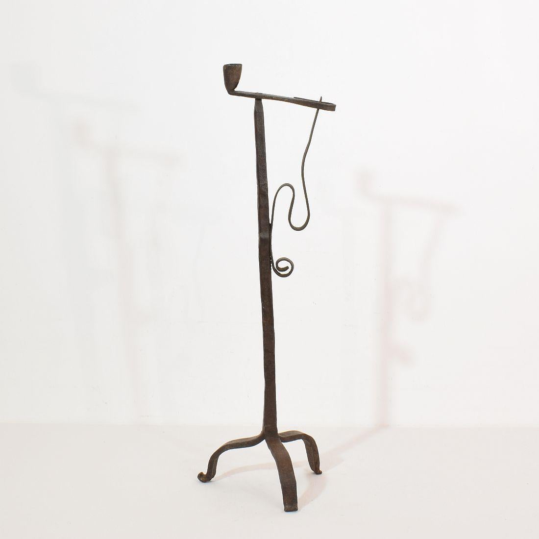 Very old and beautiful hand forged iron candleholder
France, circa 1700-1750.