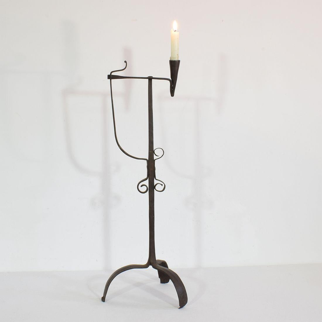 Very old and beautiful hand forged iron candleholder
France, circa 1700-1750. Weathered 