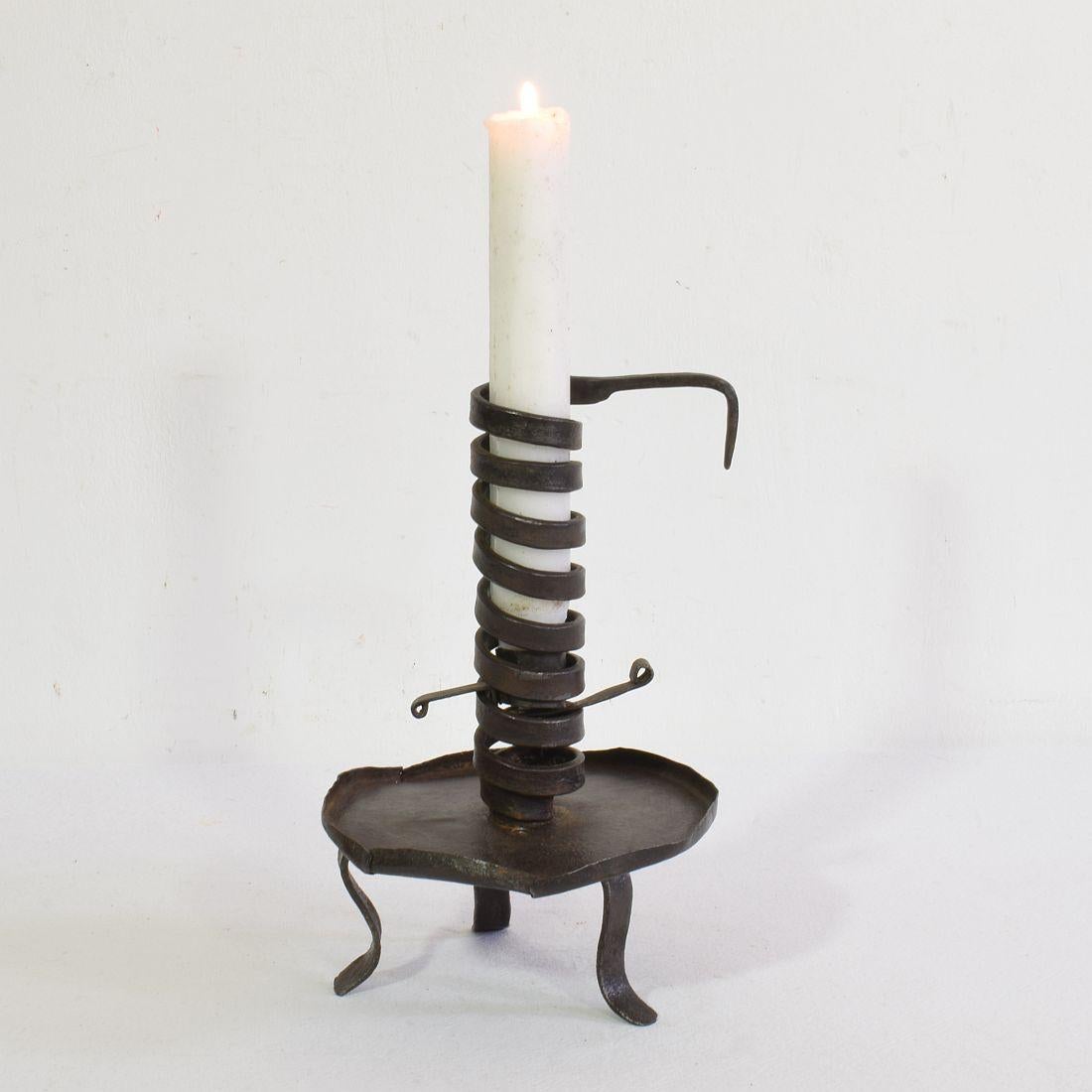 Wrought iron rat de cave candleholder, Normandie, France, 18th century. Weathered.
