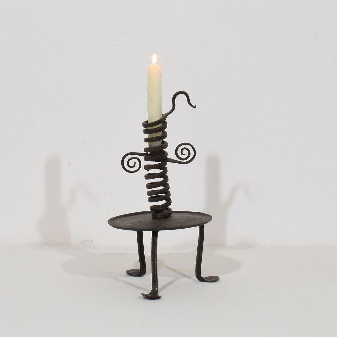 Wrought iron rat de cave candleholder, Normandie, France, 18th century. Weathered.
H:30cm  W:18,5cm D:19cm 