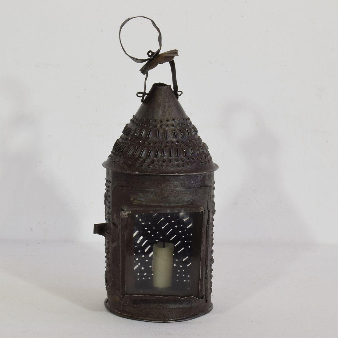Beautiful and rare iron lantern with a glass window,
France, 18th century. Weathered.



 