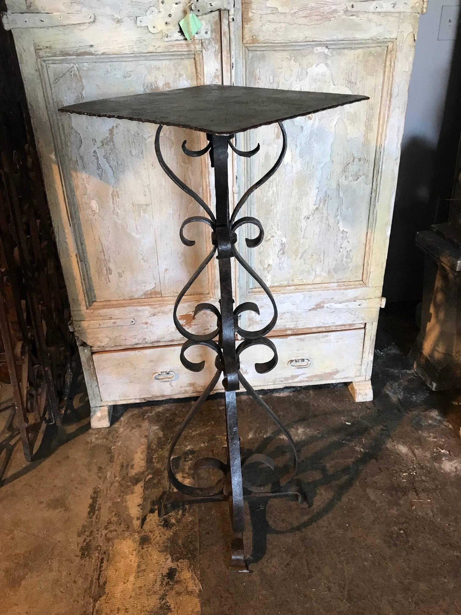A French 18th century hand forged iron fragment now as a plant stand - pedestal. Excellent quality iron work with a very handsome patina. The stand has good weight to support a substantial bust or sculpture.