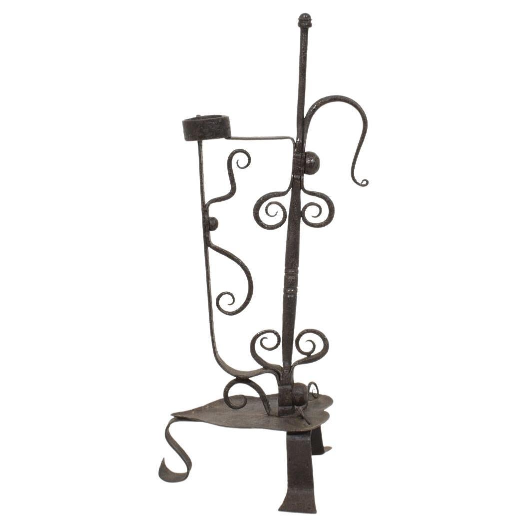 French, 18th Century, Large Hand Forged Iron Rat De Cave Candleholder For Sale