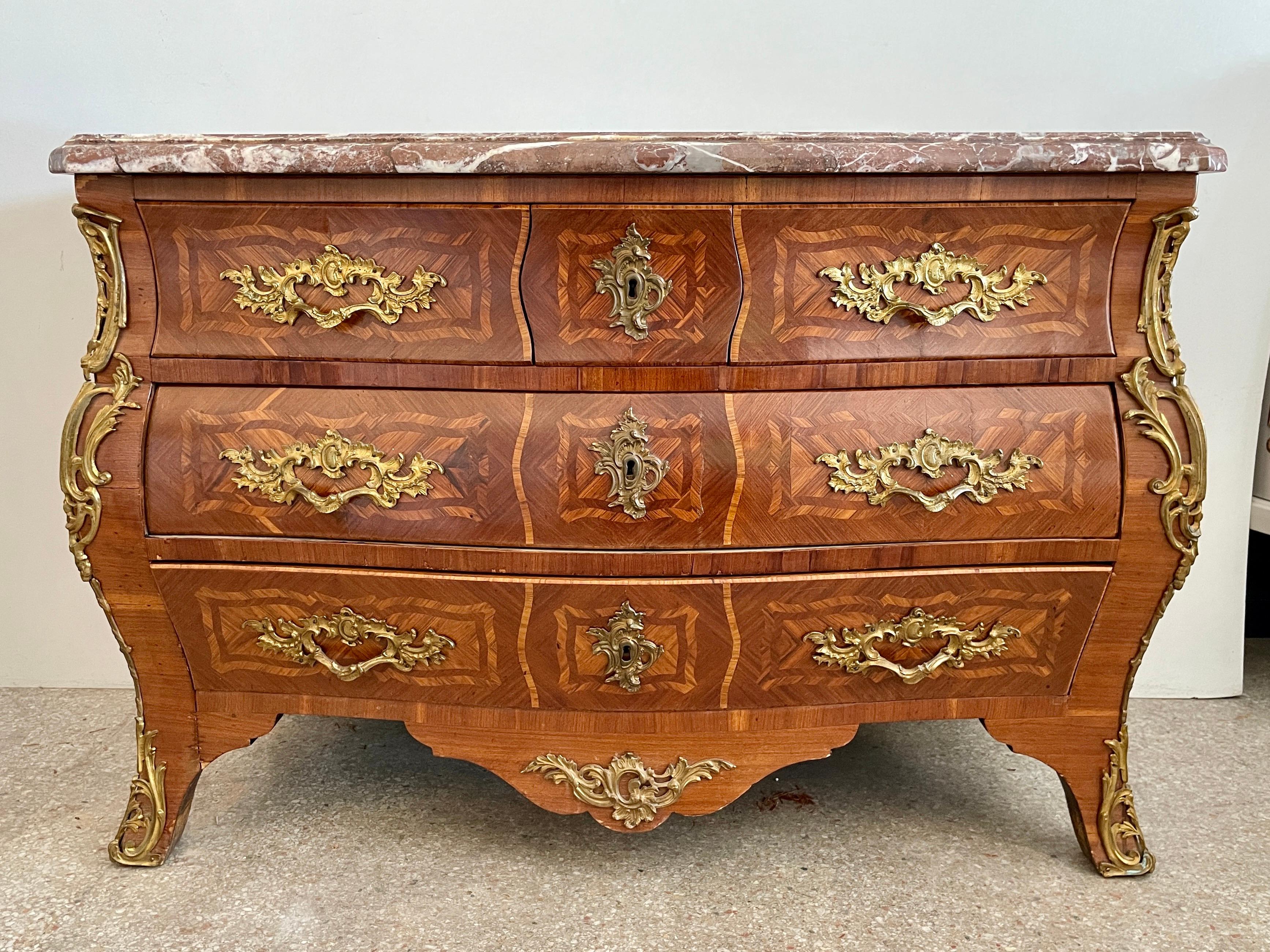 Beautiful French 18th Century Louis XV commode with five drawers for storage, and original marble top. Signed 