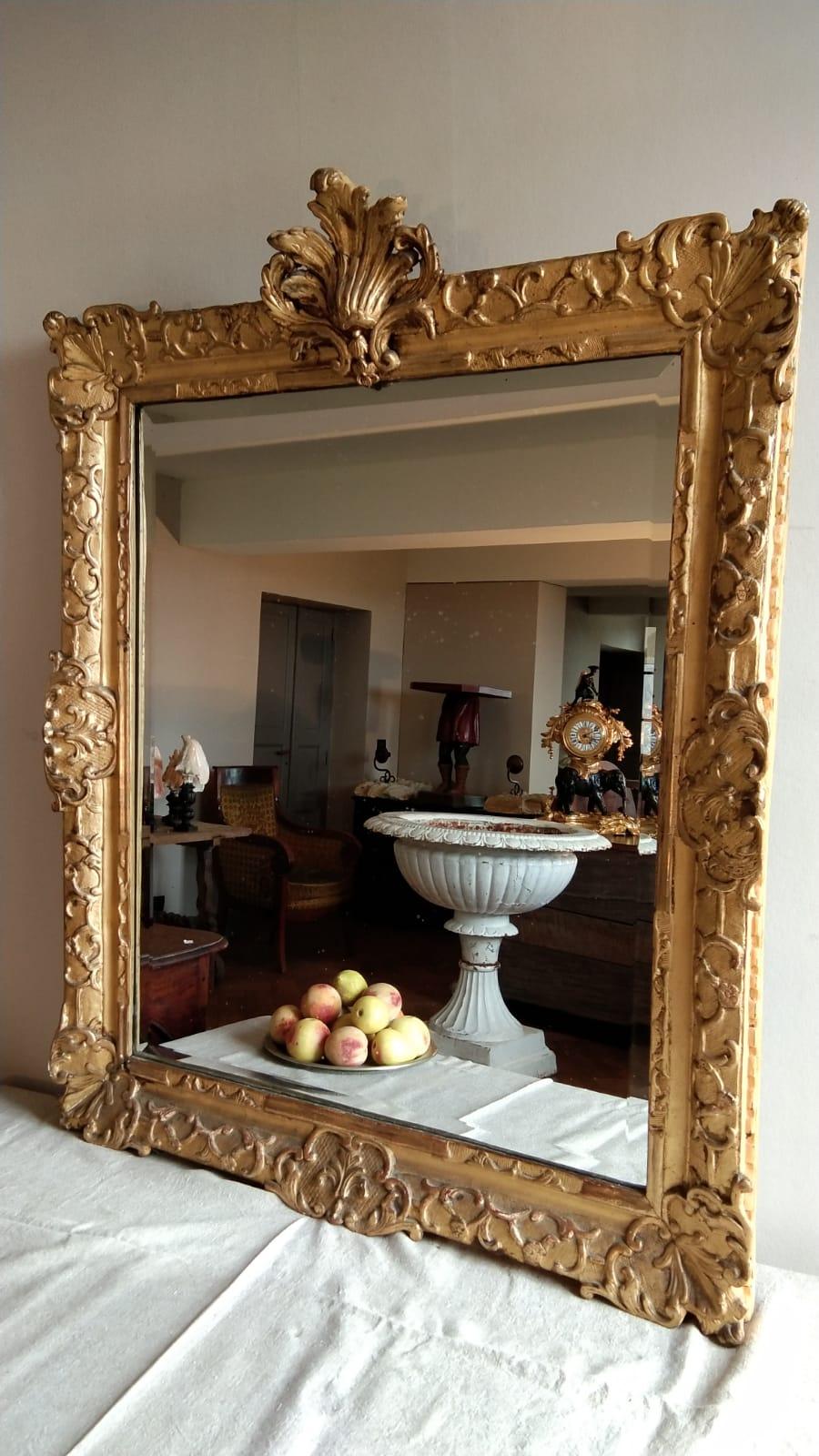 French 18th Century Louis XV Mirro with a large oak wood carved and gilt frame ( 11 cm)