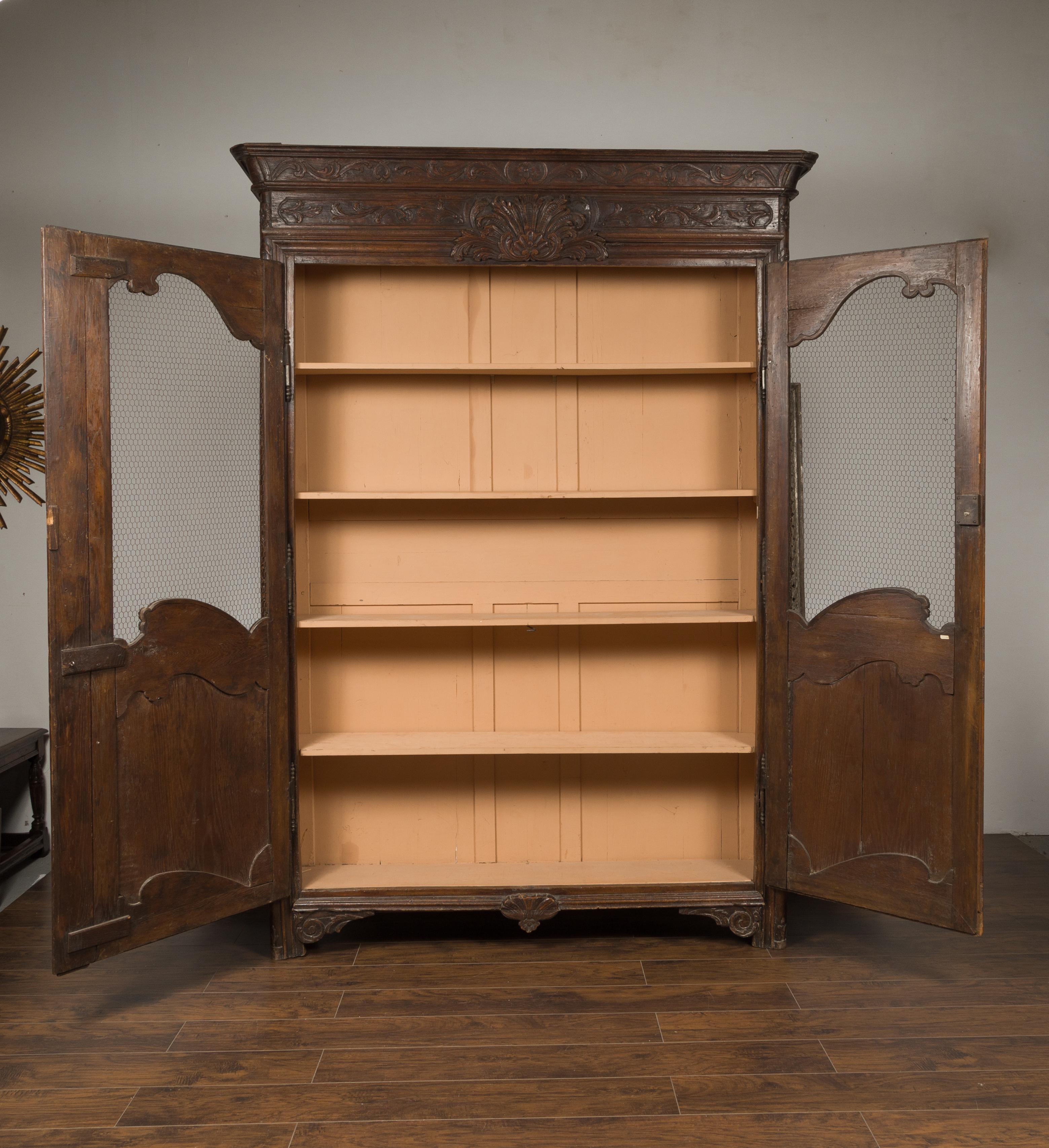 French 18th Century Louis XV Period Carved Bookcase with Chicken Wire Doors 10