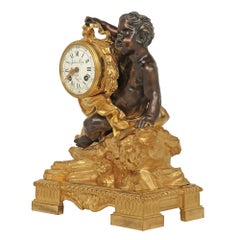 French 18th Century Louis XV Period/Louis XVI Ormolu and Patinated Bronze Clock