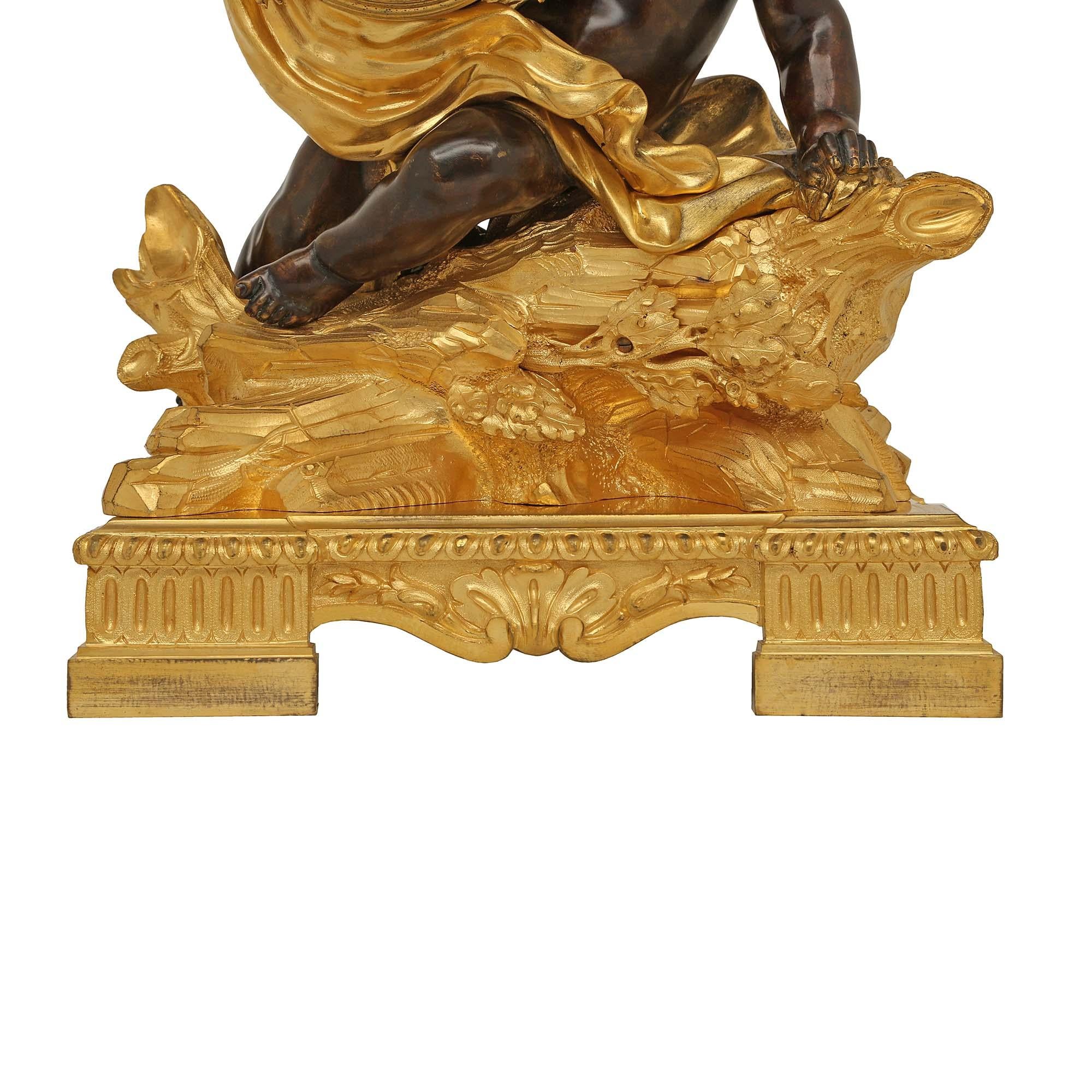 French 18th Century Louis XV Period/Louis XVI Ormolu and Patinated Bronze Clock For Sale 4