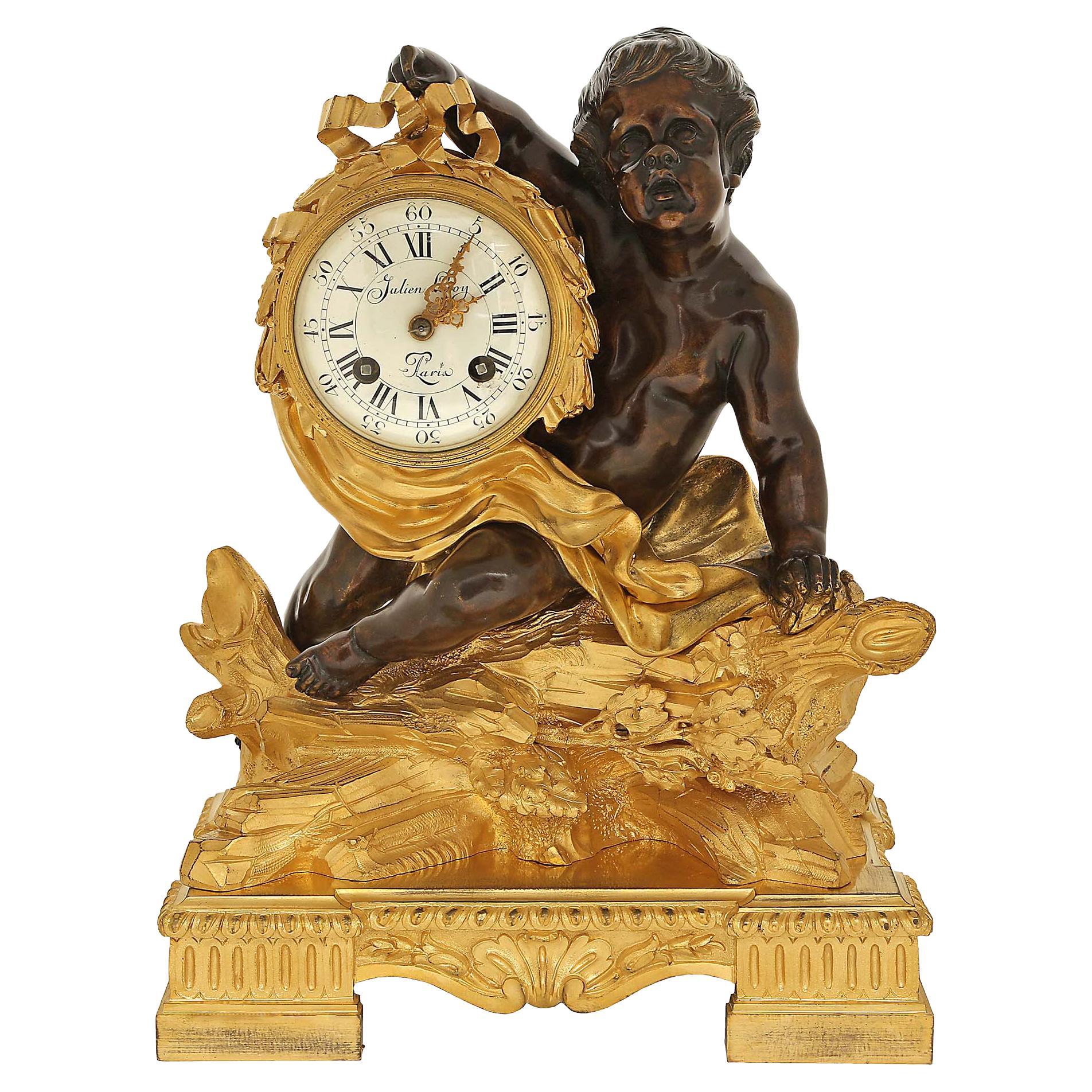 French 18th Century Louis XV Period/Louis XVI Ormolu and Patinated Bronze Clock