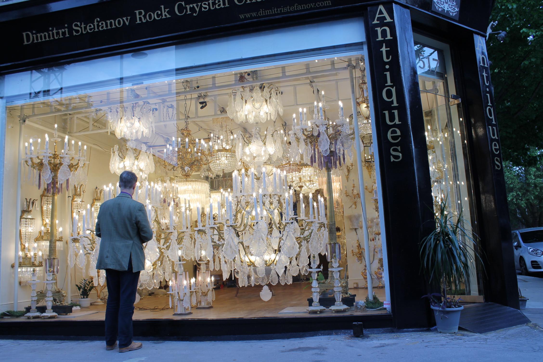 A Beautiful French 18th century Louis XV style  ormolu and rock crystal chandelier. The twelve arms chandeliers is centred by a beautiful solid rock crystal stem pendant amidst additional superb tear drop shaped pendants. The elegant and most