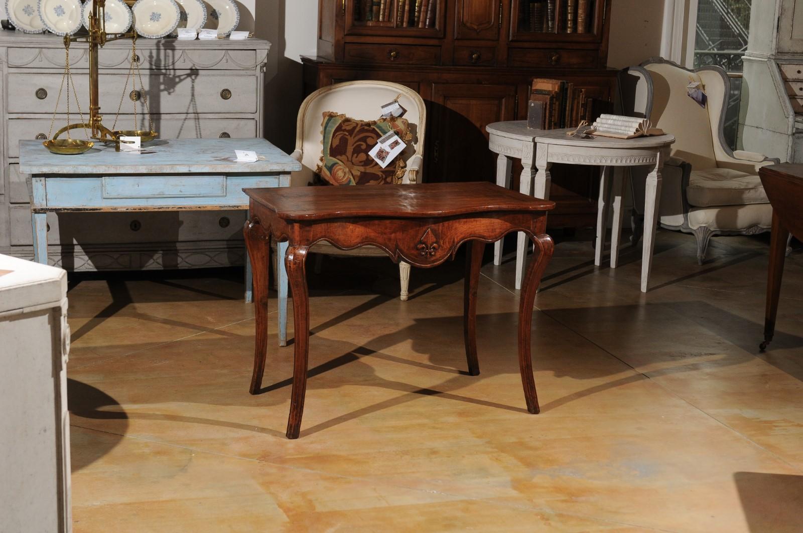 scalloped console table