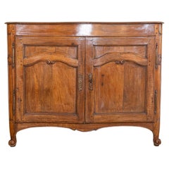 French 18th Century Louis XV Period Walnut Buffet with Carved Scrolling Motifs