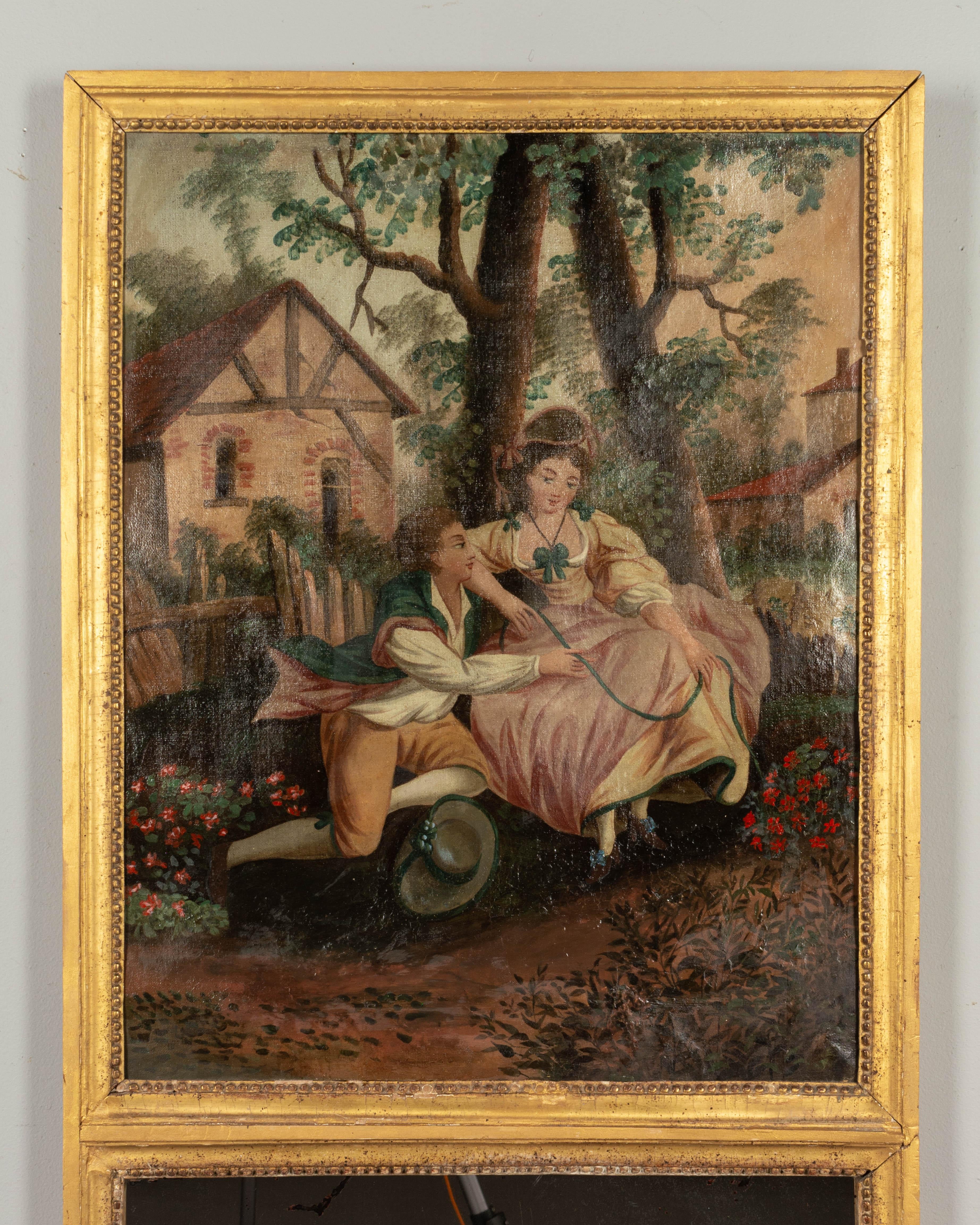 A late 18th century French Louis XV style trumeau mirror. Fine oil painting depicting a courting couple in a garden setting with a country cottage in the background. Giltwood frame with beaded border trim. Original mirror with old silvering.