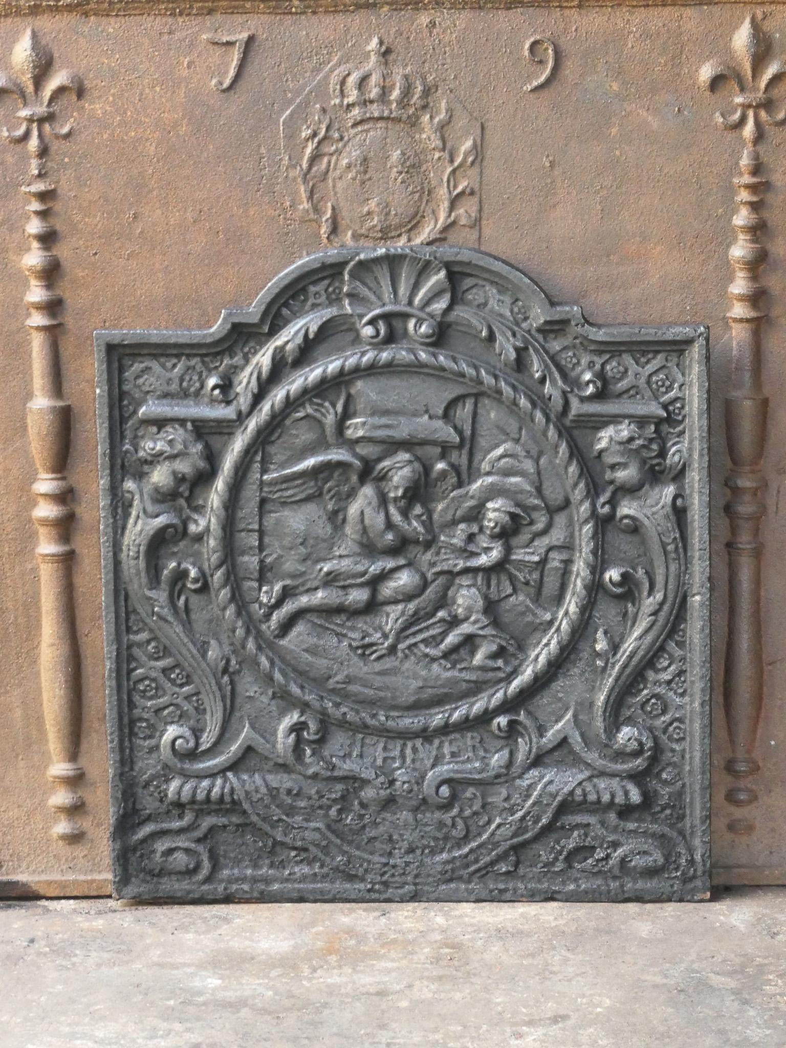 18th century French fireback symbolizing the winter. The style of the fireback is Louis XV and it is from that period.

The fireback is made of cast iron and has a black / pewter patina. The condition of is good and it is fit for use in the