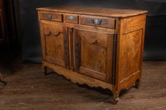 French 18th century Louis XV walnut buffet with elaborate escutcheons