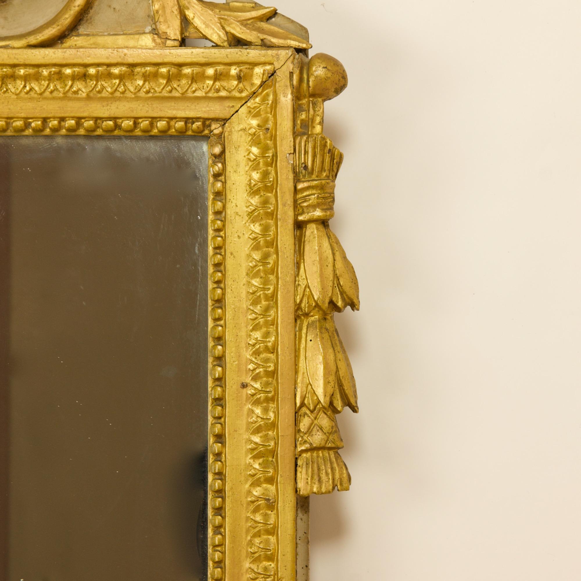 Carved French 18th Century Louis XVI Giltwood Wall Mirror or Trumeau For Sale