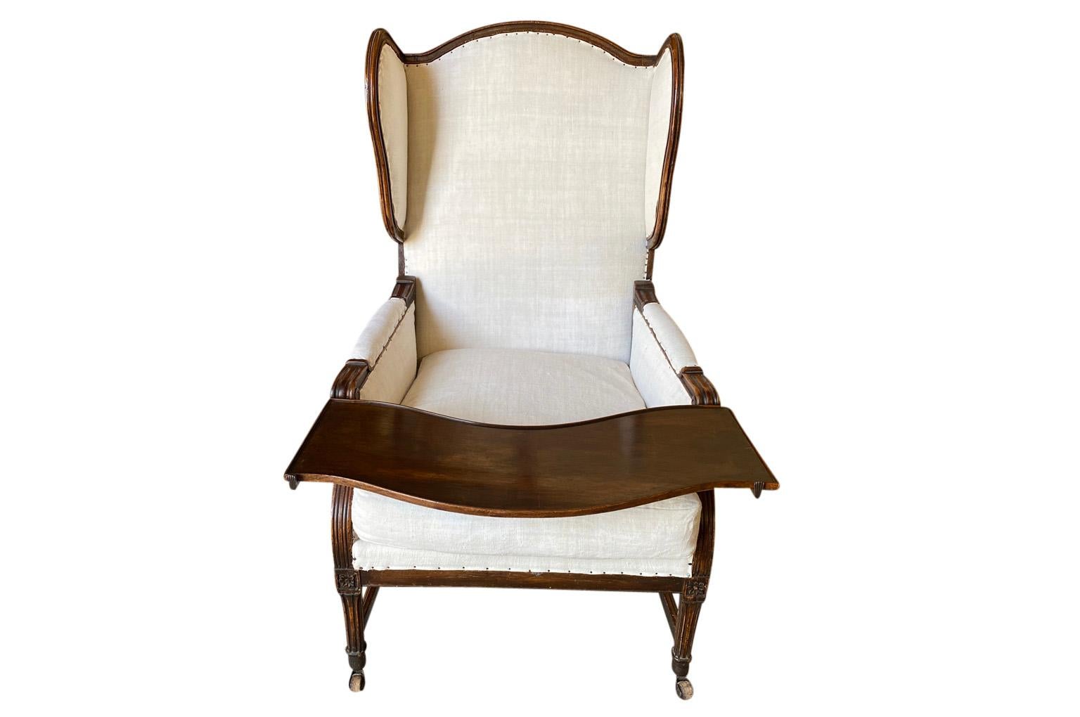 An outstanding 18th century Louis XVI period mechanical Chaise De Repos from Aix En Provence, France. Soundly crafted from walnut, this chair is constructed with the Cremaillere system - for reclining. There are also iron pullouts recessed in the