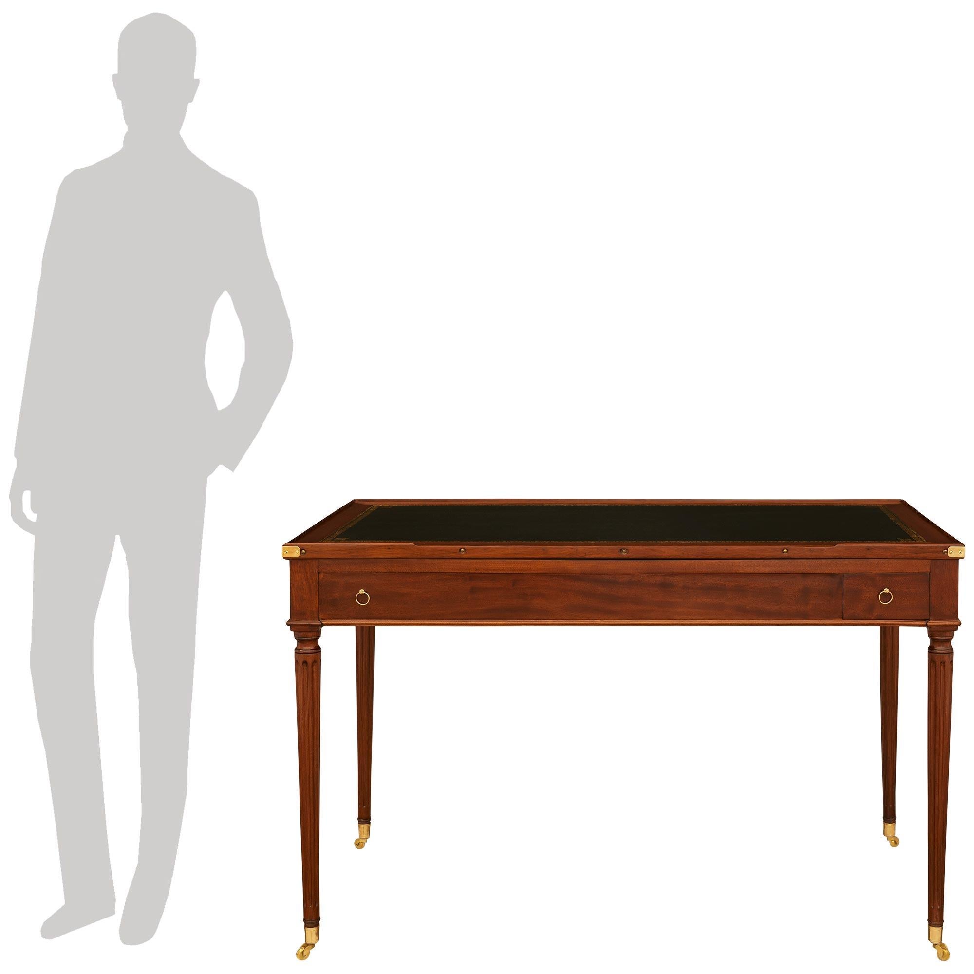 An elegant and high quality French 18th century Louis XVI Period Mahogany games table. This wonderful 