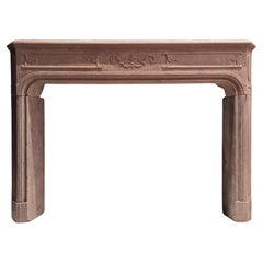 Cheminée française du XVIIIe siècle en pierre de porphyre rose