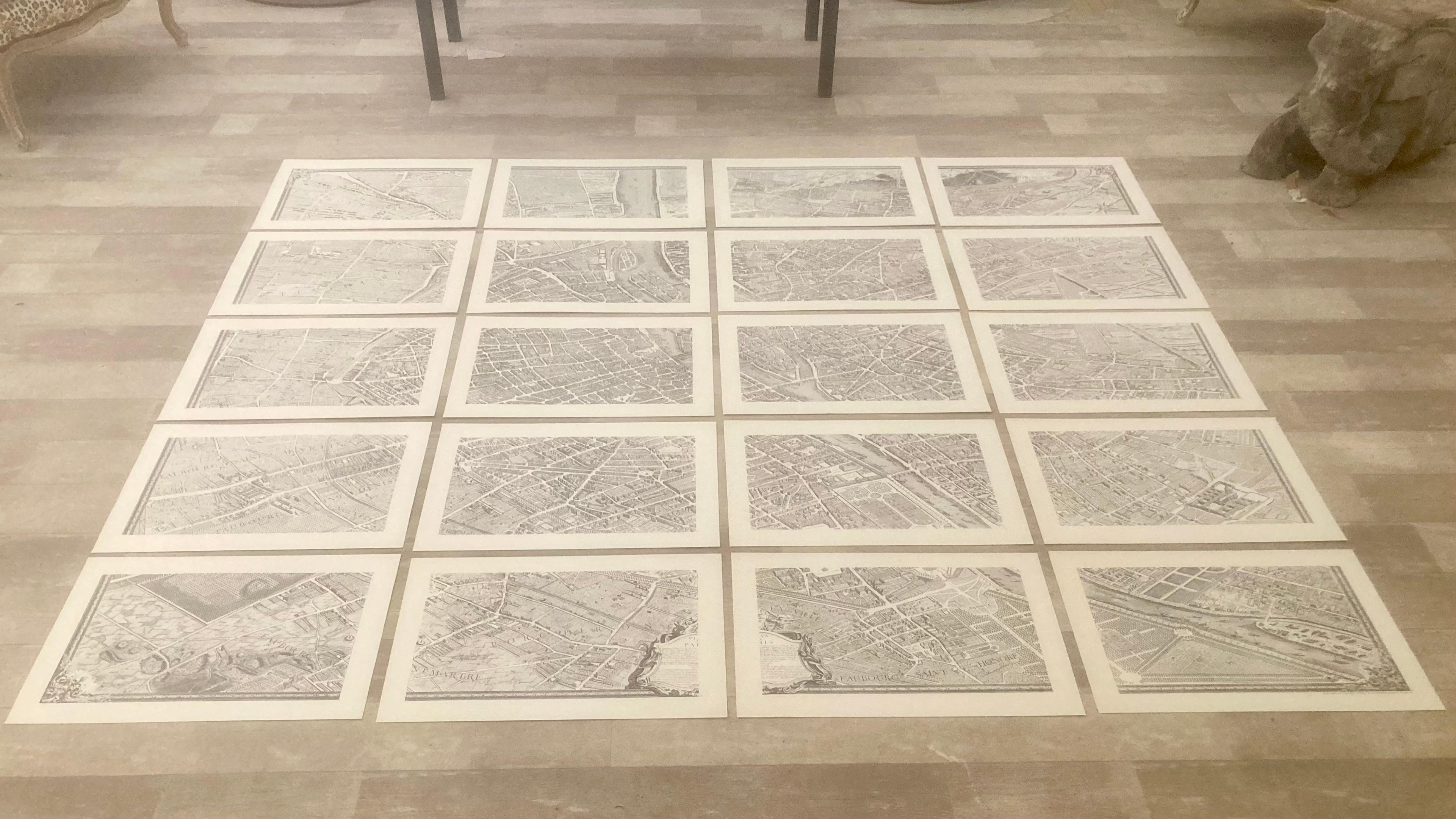 Complete Paris map set of etchings by Turgot. This printing is from the 1960s and have warm natural color to the paper. Frame each individually to your liking. The overall dimension is 89” x 77.5” and each plate is 22.25” wide by 15.5” high.