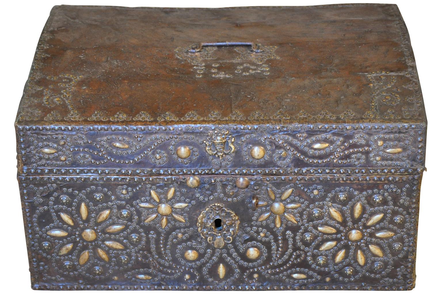 A very beautiful 18th century marriage coffee - or trunk of unusually small proportion. Wonderfully clad in leather with bronze decorative nailhead design.