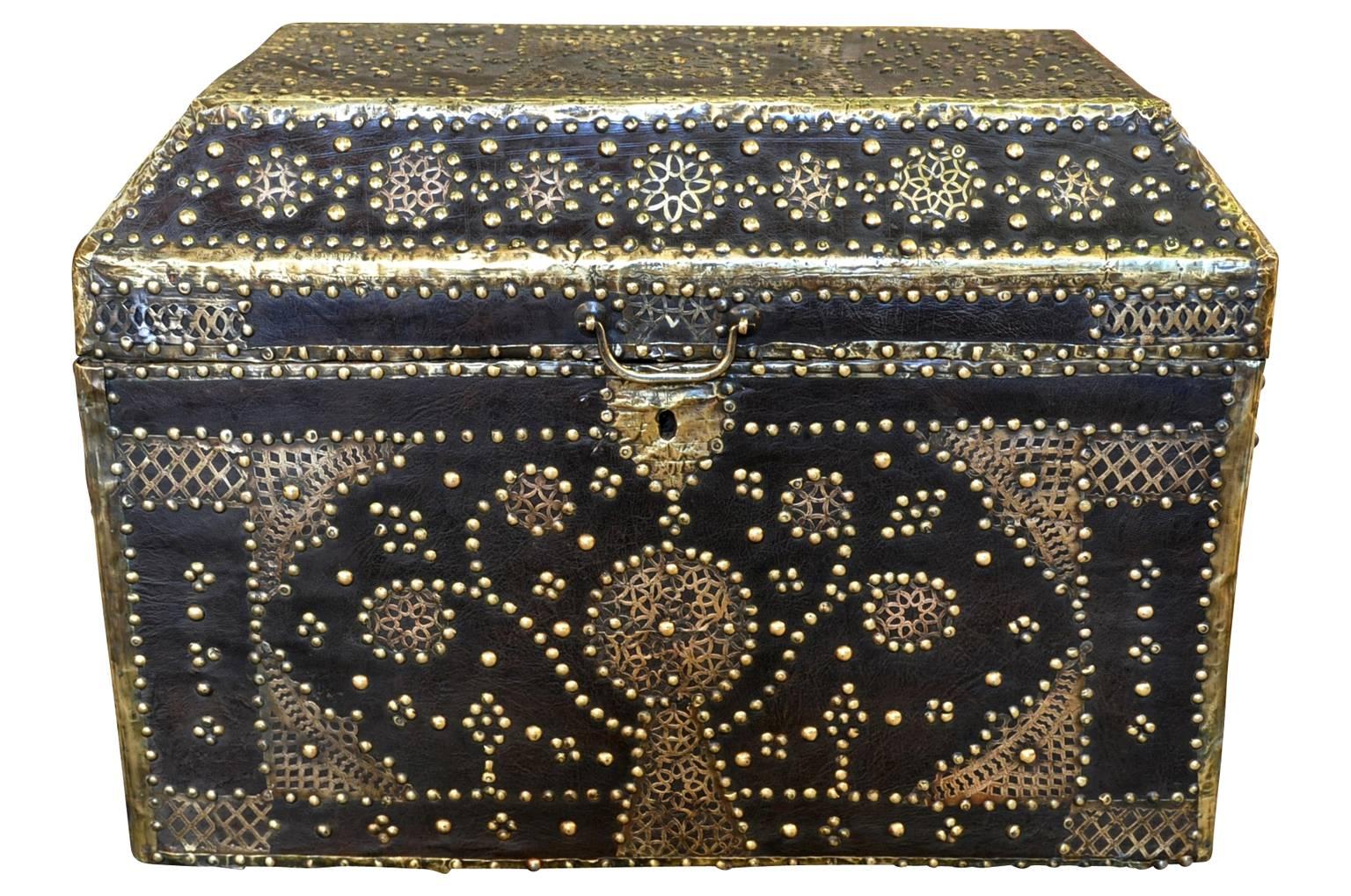 An exquisite 18th century marriage trunk or Malle from the Provence region of France. Beautifully constructed in wood clad with leather and bronze nailheads and hardware. An exceptional piece to add charm to any living area.