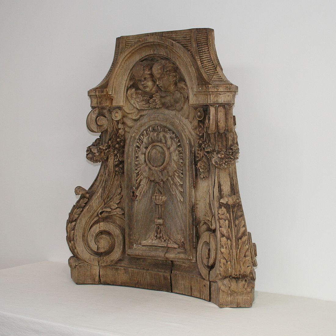 Unique and truly beautiful weathered oak tabernacle front, France, circa 1750. Weathered, small losses and old repairs. This piece can stand on itself.
 