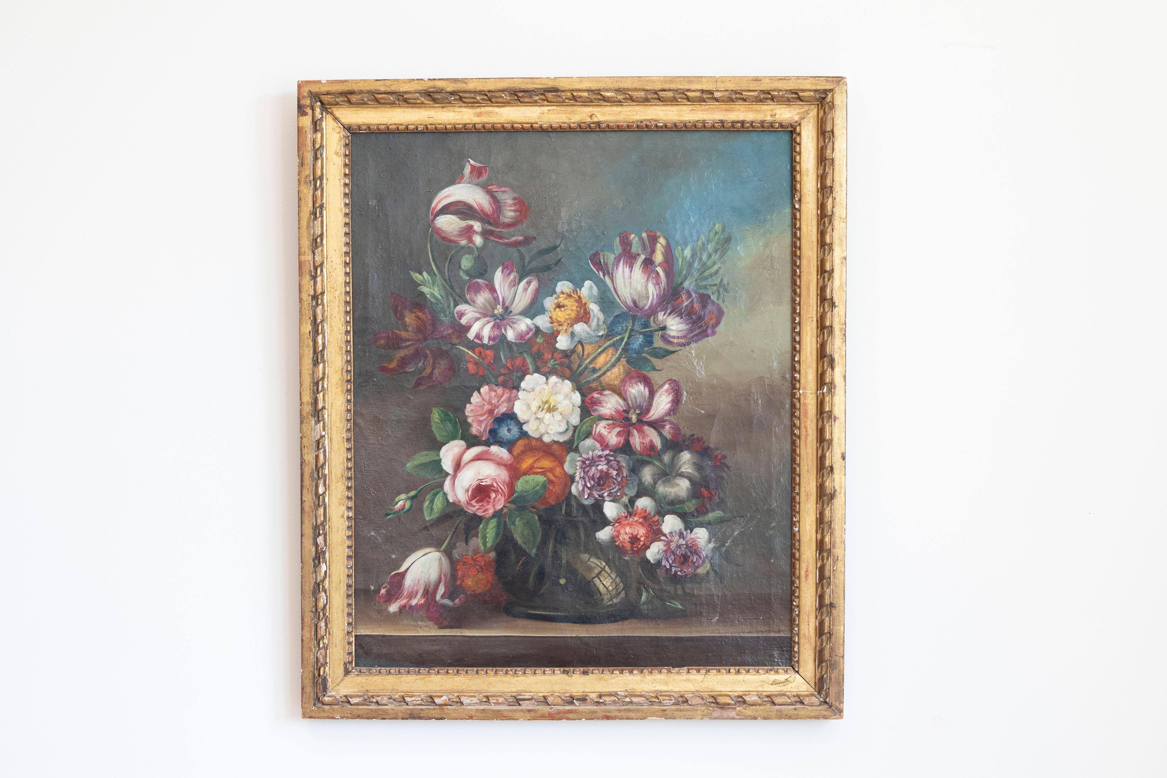 A French oil on canvas still-life floral painting in the Dutch School style from the 18th century, in giltwood frame. Born in France during the Age of Enlightenment, this exquisite floral painting presents a strong influence from the Dutch School.
