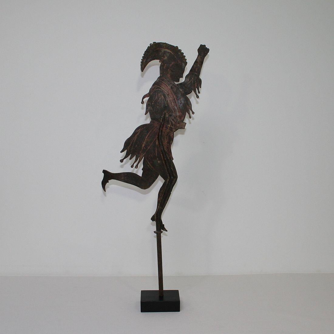 Unique hand forged iron weathervane representing a harlequin. Beautiful eyecatcher.
France, circa 1750-1800. Weathered and losses.
Measurement here below is inclusive the wooden base.