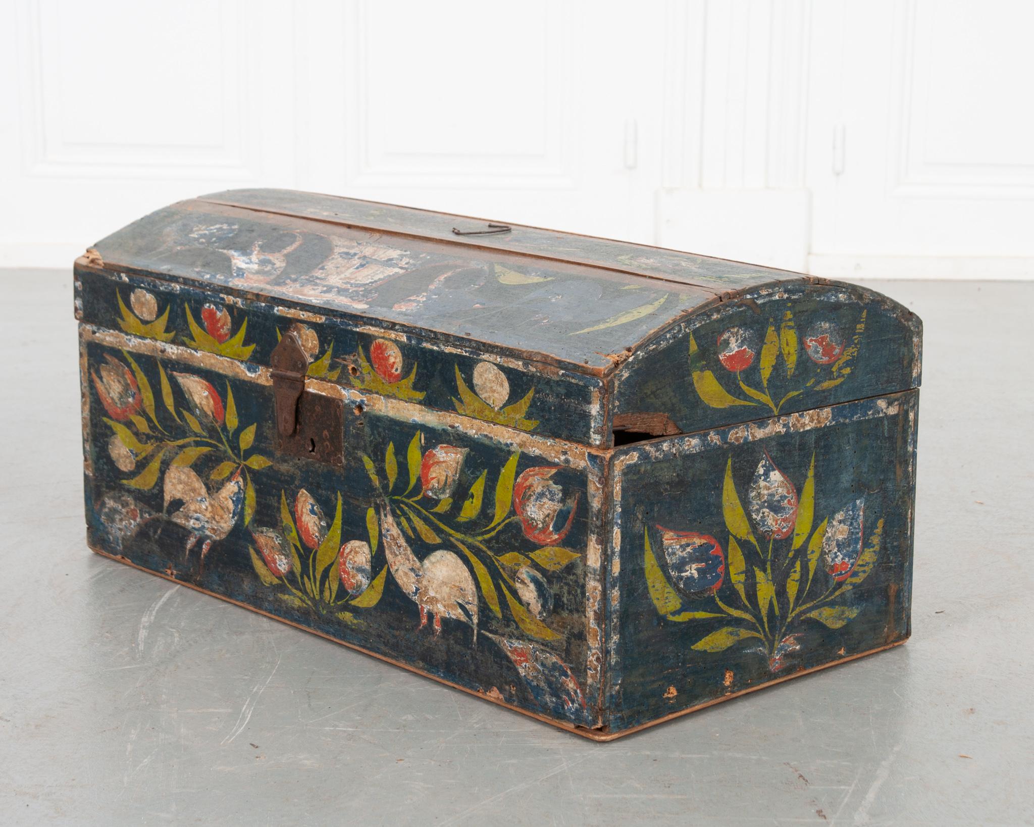 A fantastic antique wedding or hope chest – from Normandy, France – decorated with hand-painted floral details that grace every surface. One of this size and ornamentation most likely would have served as linen storage for a woman preparing for