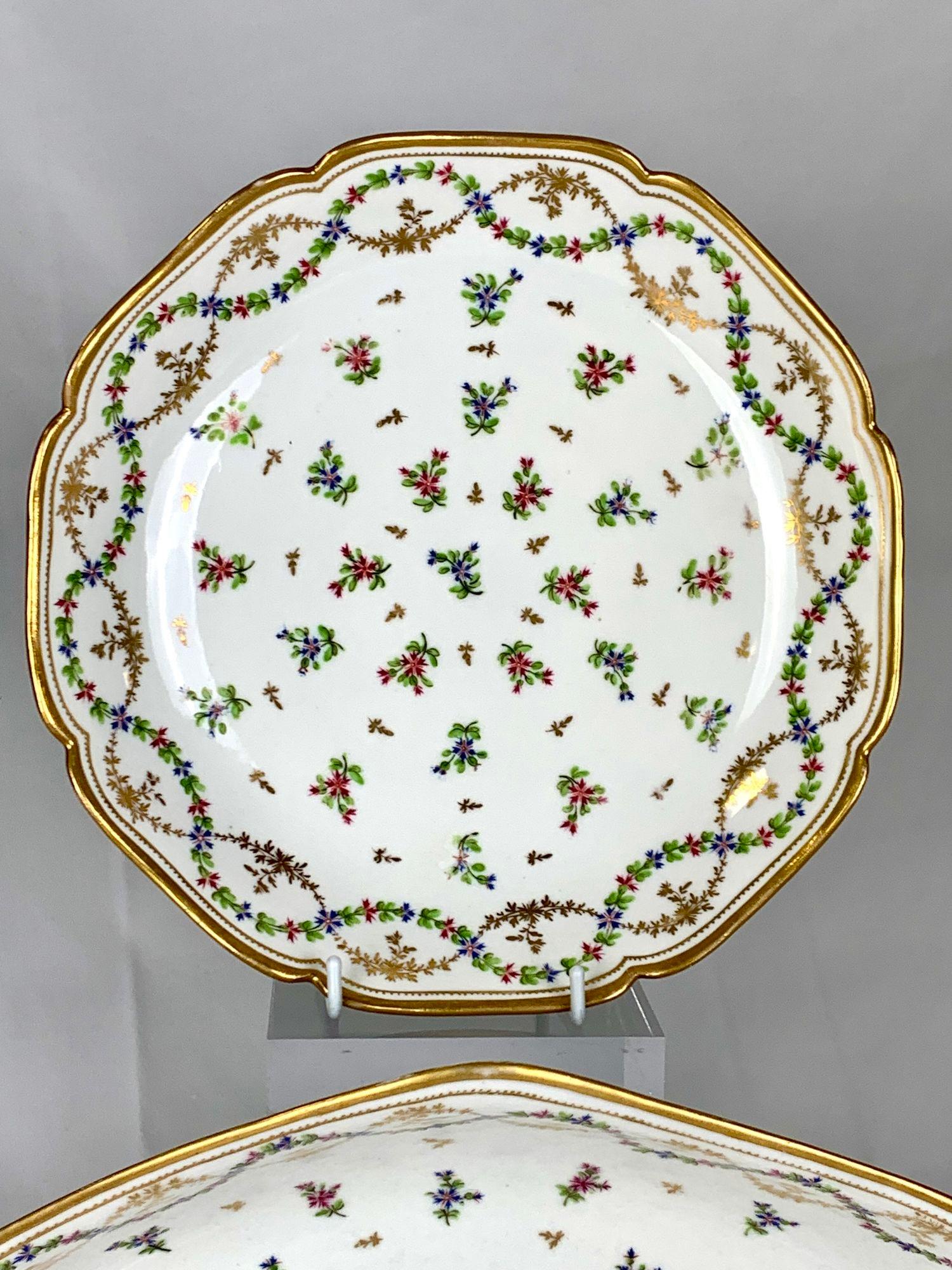 This pair of 18th-century Locré French porcelain dishes was hand-painted in the 