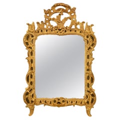 Miroir en bois doré français du XVIIIe siècle de la période de la Rgence